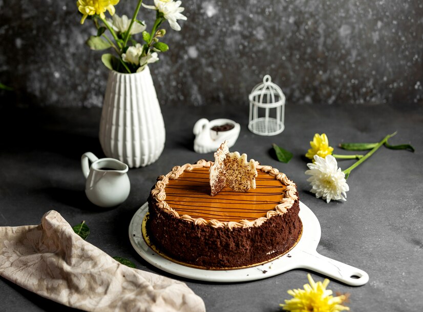 A decadent caramel cake, complete with a swirl of creamy caramel frosting and a sprinkle of sea salt.